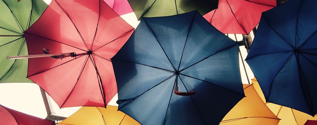 underside of umbrellas to represent protection afforded by the best insurance policy for SMEs