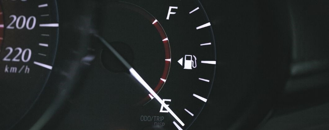 empty fuel gauge of fleet insured car